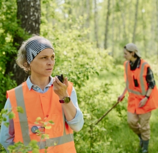 mature-rescuer-speaking-on-walkie-talkie-2025-03-15-18-37-58-utc