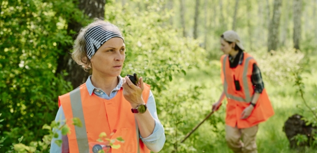 mature-rescuer-speaking-on-walkie-talkie-2025-03-15-18-37-58-utc